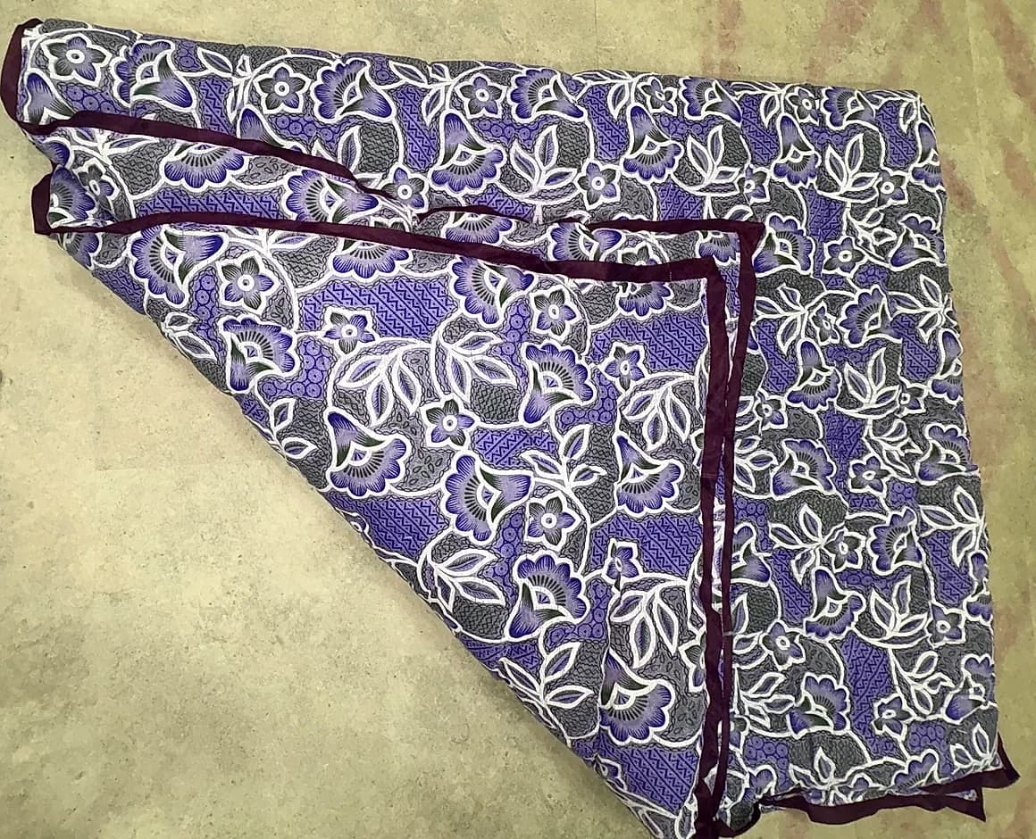 Soft lavender floral printed fleece razai folded diagonally